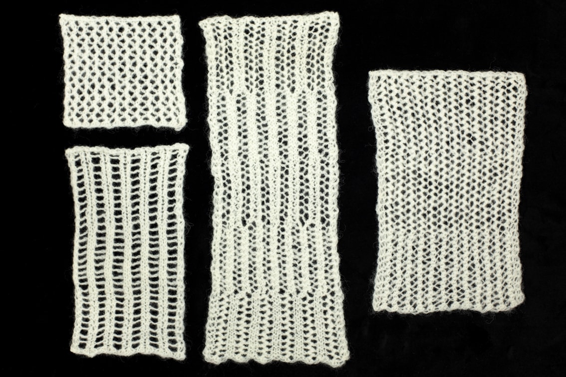 Openwork hand knitwear design swatches by Alice Starmore