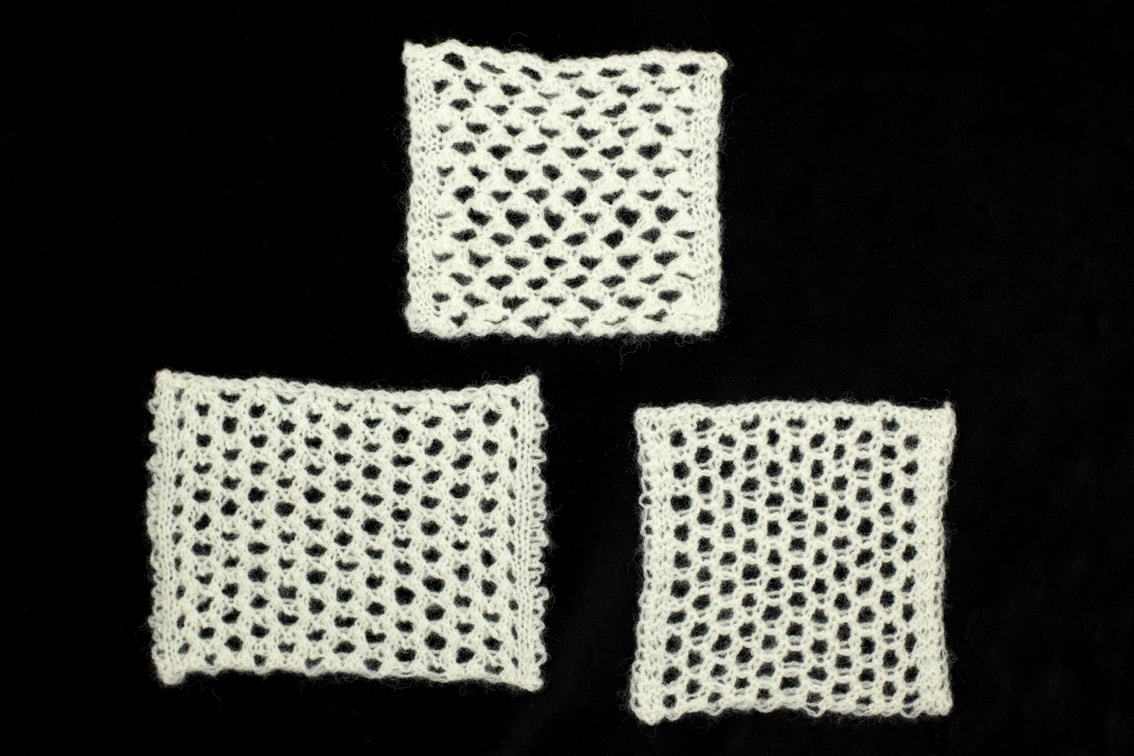 Openwork hand knitwear design swatches by Alice Starmore